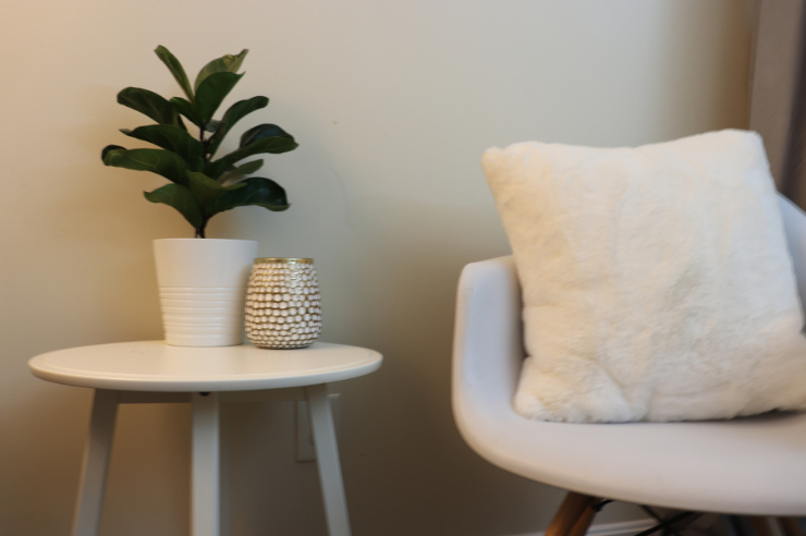 Cream coloured chair with side table | Home Insurance | An Post Insurance