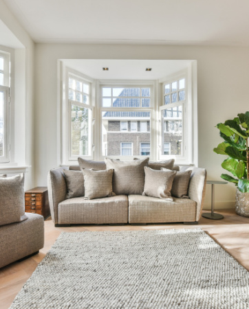 Spacious living room with grey sofas | An Post Insurance